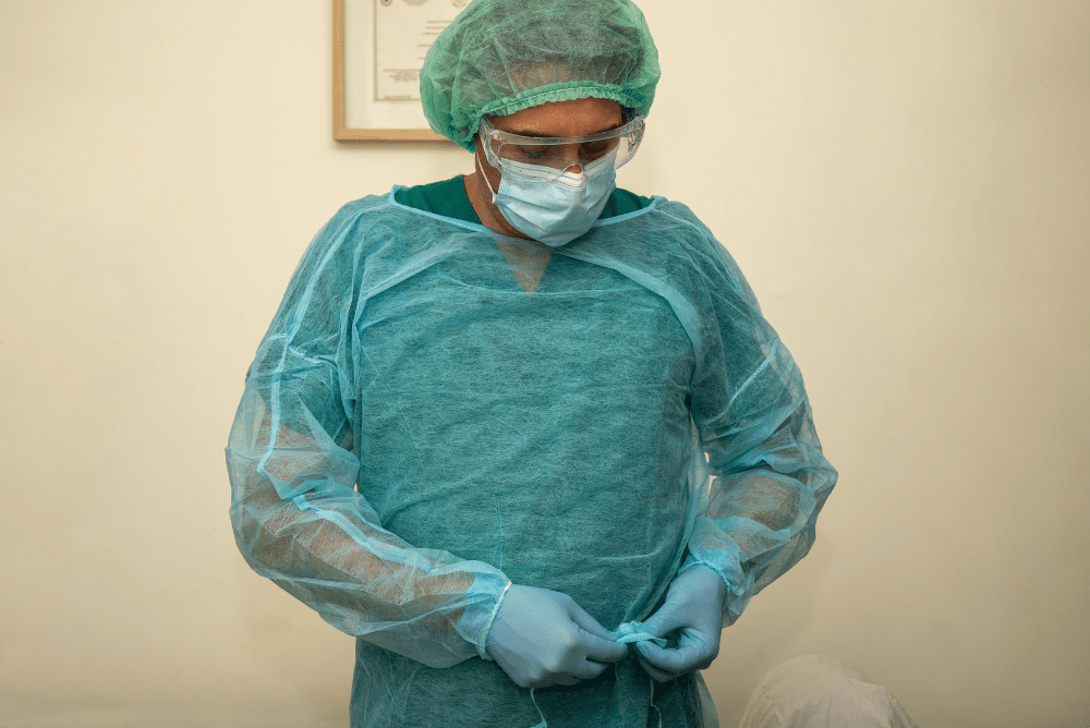 A healthcare professional in protective gear, from a medical equipment supplier in Malaysia.