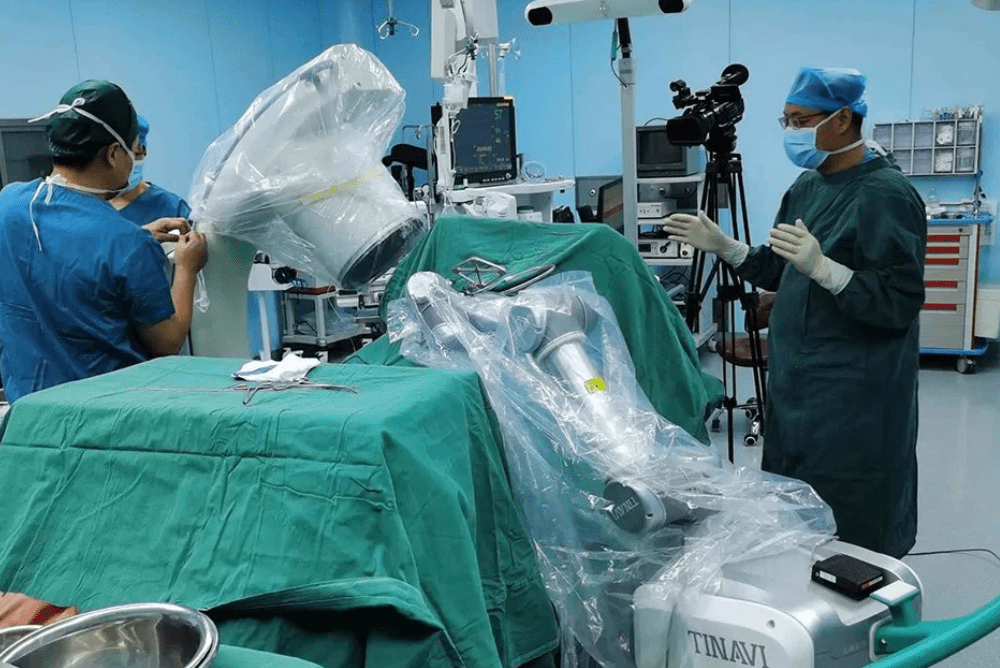 Doctor using equipment in an operating room, from a leading cardio product distributor.