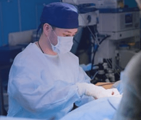 Surgeon performing a procedure from a medical equipment supplier in Malaysia.